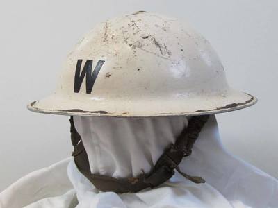 White ARP Warden's helmet with black 'W'