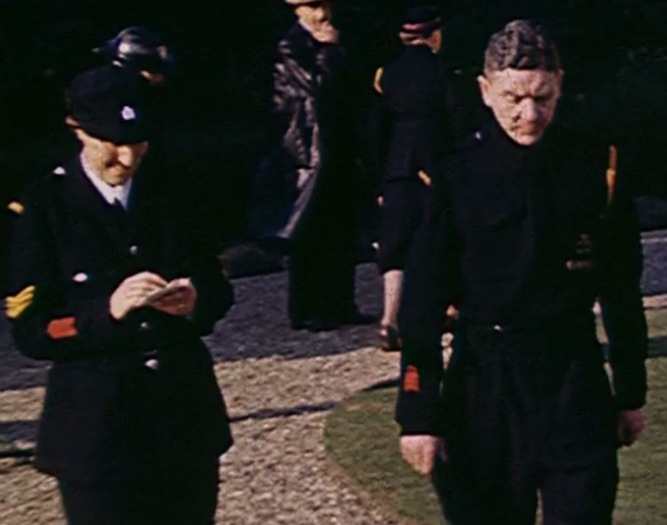Still from a colour film showing war service chevrons being worn on battledress and tunic