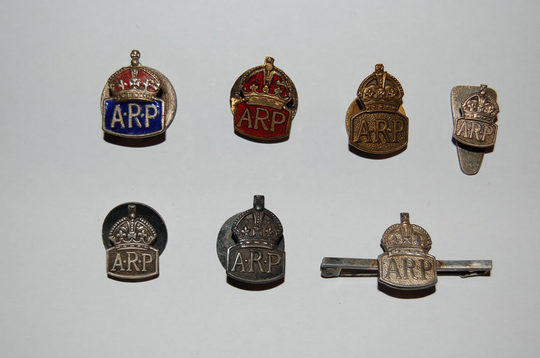 WW2 ARP lapel badges.