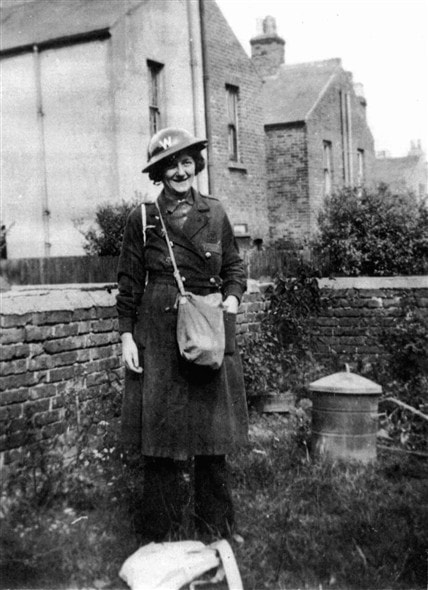 Lady warden with the civilian duty respirator gas mask carrier