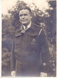 An ARP Warden from Hendon with both the London-style Incident Officer and Bomb Reconnaissance badges on his lower right sleeve.