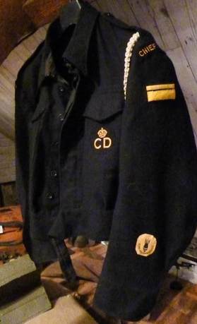 Original Chief Warden battledress with Bomb Reconnaissance sleeve badge.