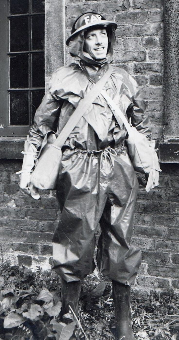 A member of a First Aid Party wearing the protective anti-gas oil skins