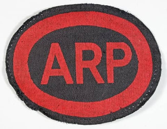 Printed red-lettered ARP breast badge
