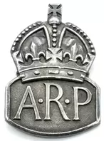 Silver ARP lapel badge often worn on Civil Defence berets