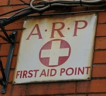 Original ARP FIRST AID POINT sign on Cullompton Town Hall
