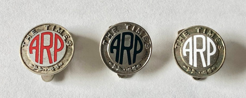Three ARP badges issued by the 