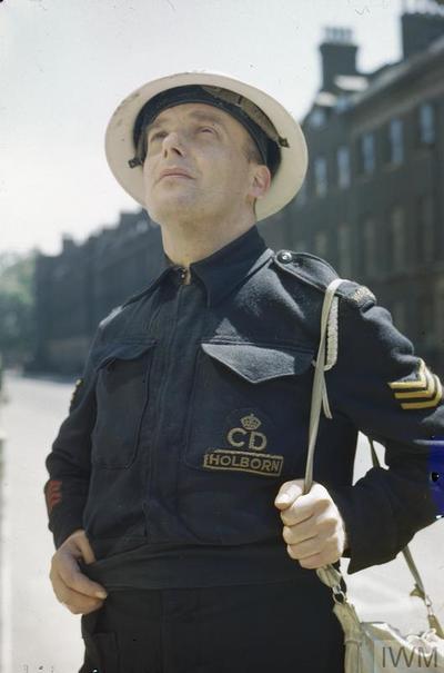 Original WW2 photo of an ARP Warden in Holborn wearing battledress.