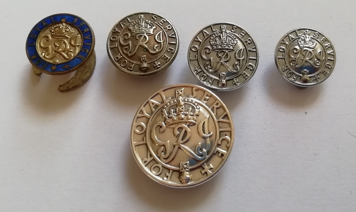 Miniature versions of the King's Badge