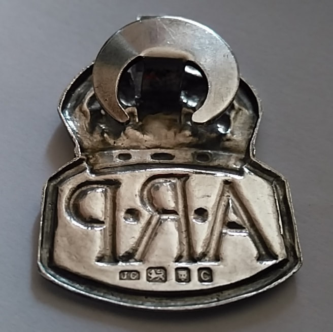 J.C. hallmark on ARP badge