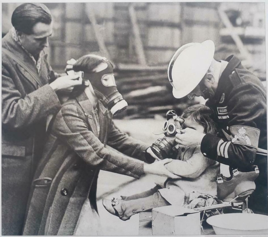 WW2 ARP Warden From Kilburn, London Aids With Gas Masks