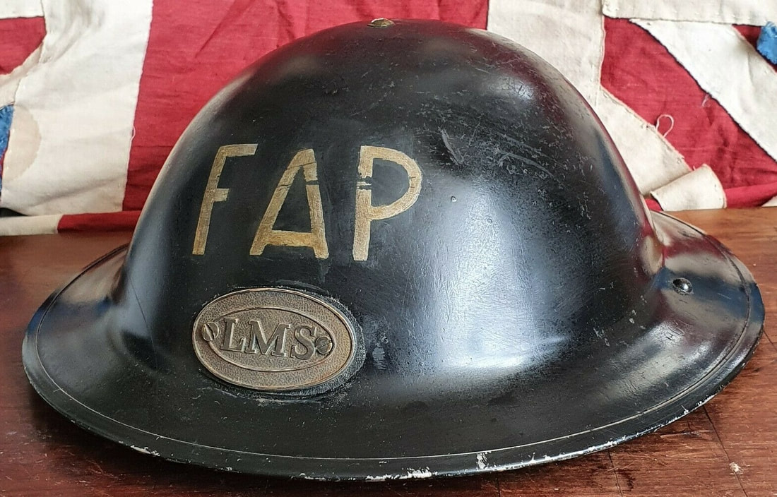 Fake WW2 ARP / Civil Defence Helmets With Railway Insignia