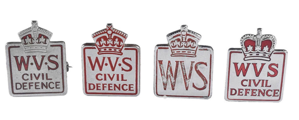 Two on the left are wartime WVS Civil Defence badges. The two are the right are post-war examples
