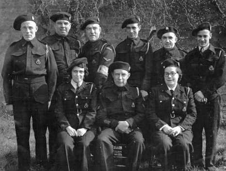 ARP wardens wearing the wool beret - note the many different ways of weraing the beret.