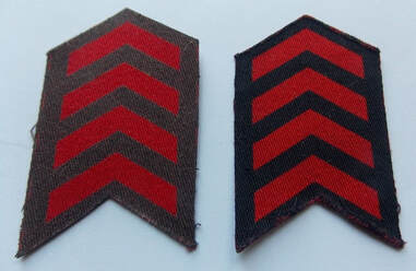 WW2 war service chevrons colour comparison - blue-grey (on the left) and the navy blue (on the right).