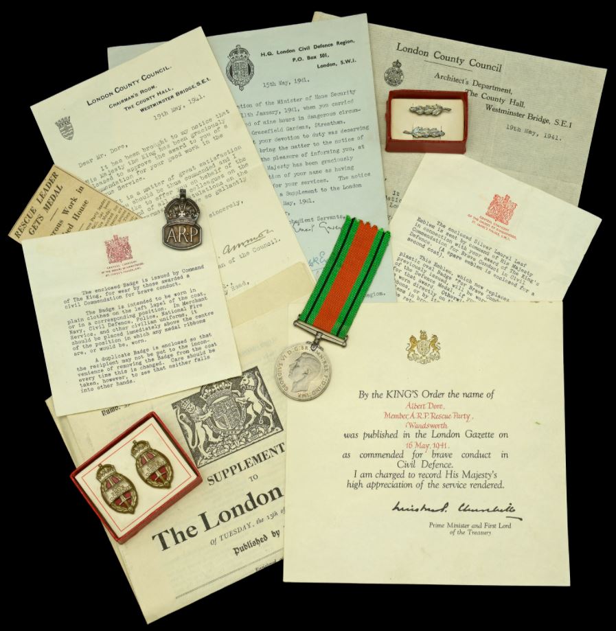 Albert Dore's Defence Medal, King’s Commendation for Brave Conduct badges and laurels and ARP badge