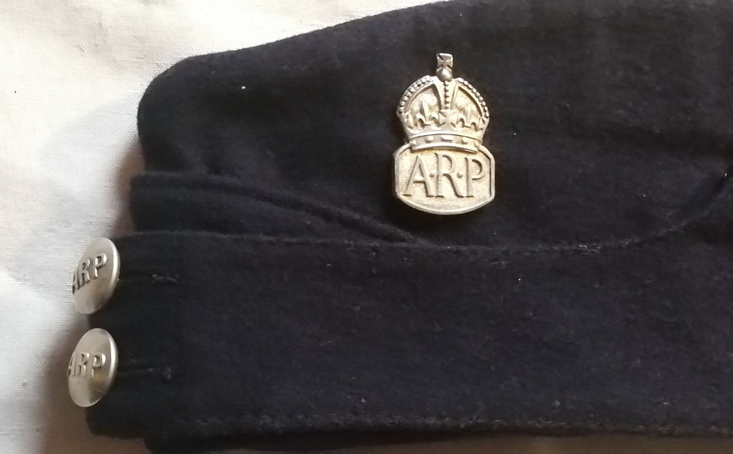 Civil Defence side cap with ARP badge and buttons